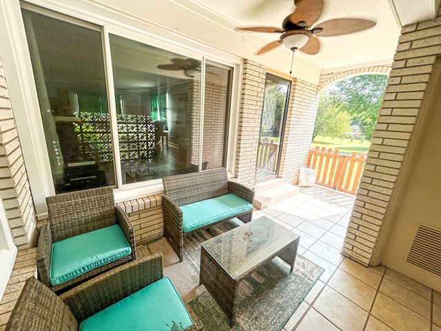 view of patio / terrace featuring ceiling fan