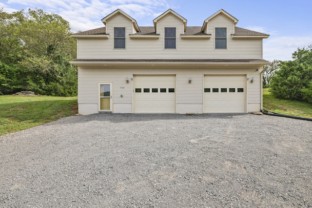 garage with a yard