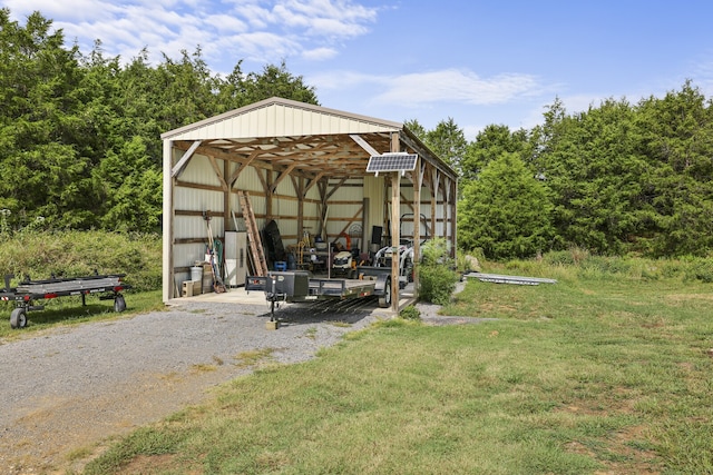 view of outdoor structure with a yard