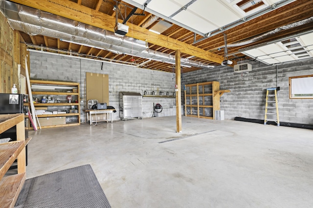 garage featuring a garage door opener