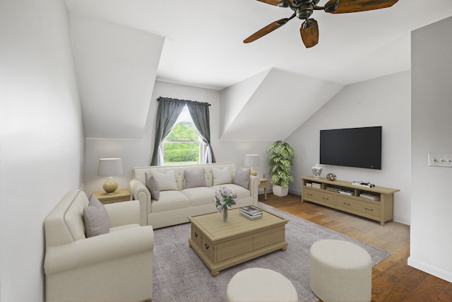 living room with lofted ceiling, ceiling fan, and light hardwood / wood-style floors