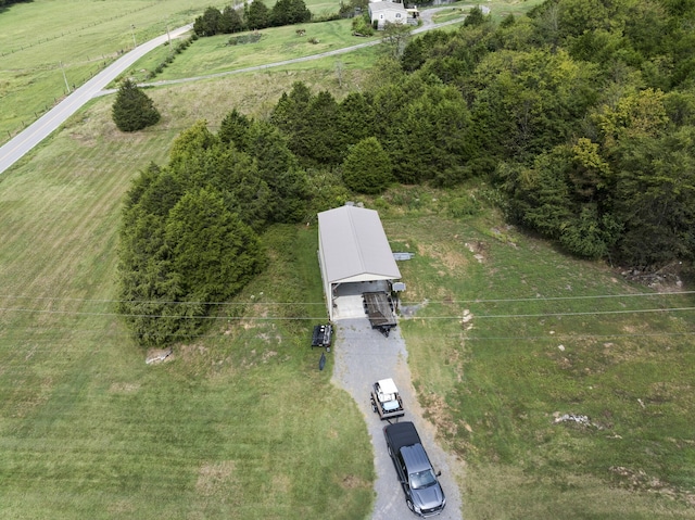 birds eye view of property featuring a rural view