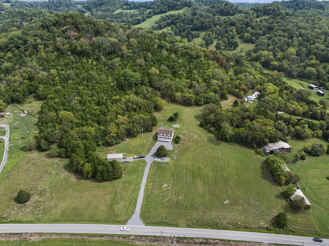 birds eye view of property featuring a rural view