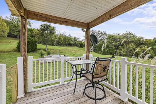 deck featuring a yard