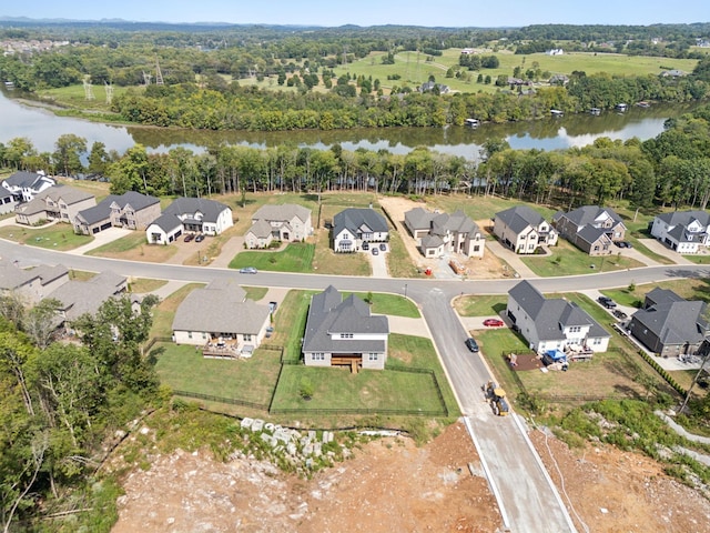 aerial view featuring a water view and a residential view