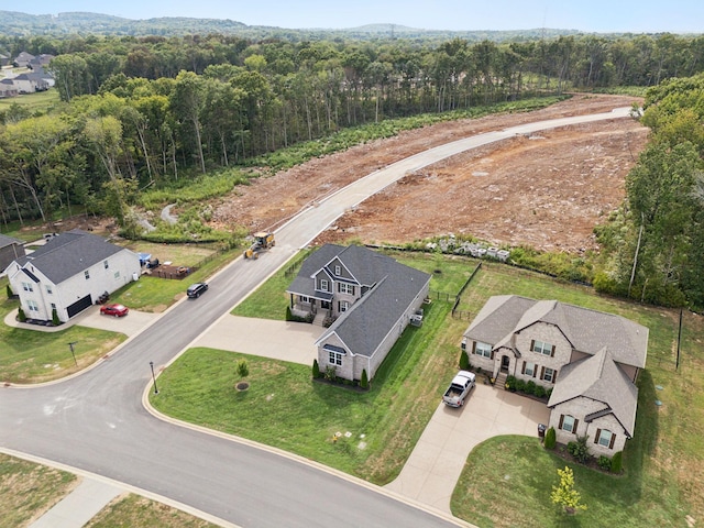 aerial view with a wooded view