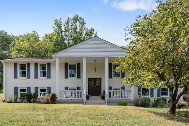 bi-level home with a front yard