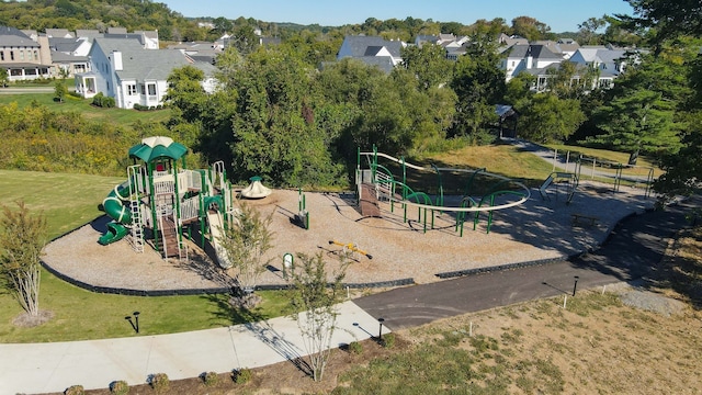 view of playground featuring a lawn