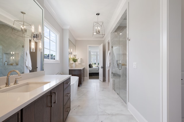 bathroom with ornamental molding, vanity, an enclosed shower, and an inviting chandelier