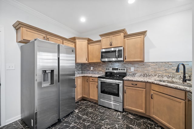 kitchen featuring light stone countertops, appliances with stainless steel finishes, and decorative backsplash