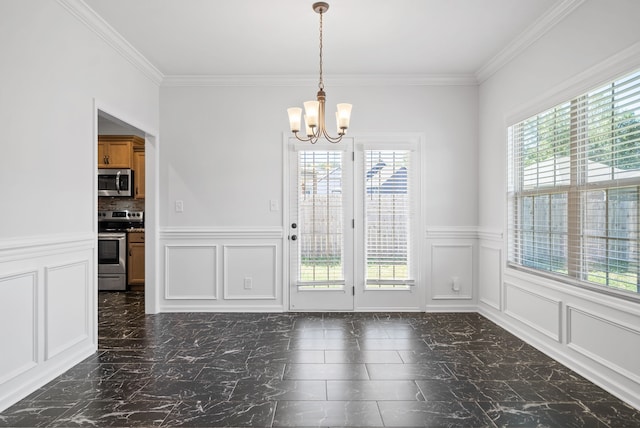 unfurnished dining area featuring an inviting chandelier and ornamental molding