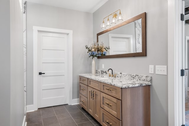 bathroom with vanity and tile patterned floors