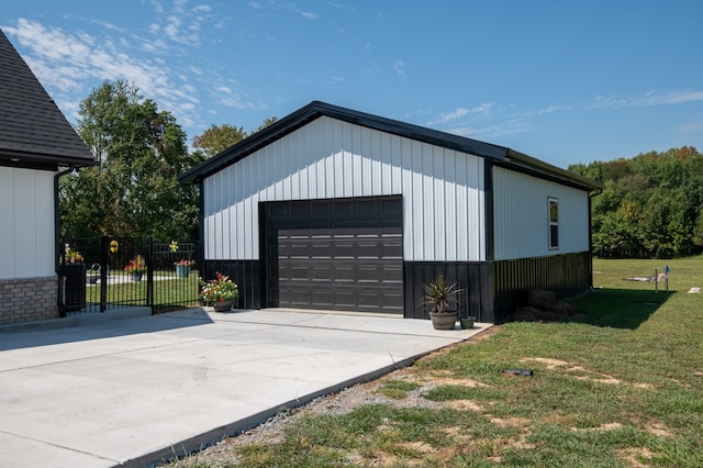 garage featuring a yard