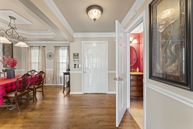 entryway featuring crown molding, hardwood / wood-style floors, and sink