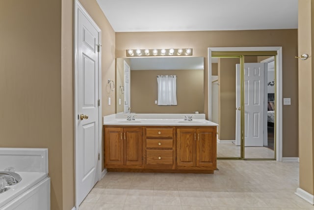 bathroom featuring a bathing tub and vanity