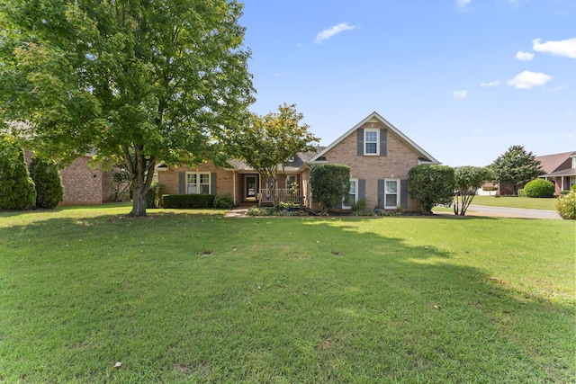 view of front of property with a front lawn