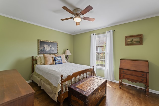 bedroom featuring crown molding, ceiling fan, and wood-type flooring