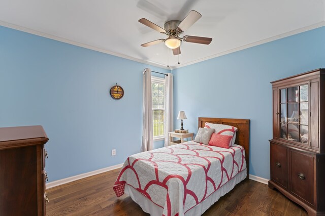 bedroom featuring ornamental molding, ceiling fan, and dark hardwood / wood-style floors