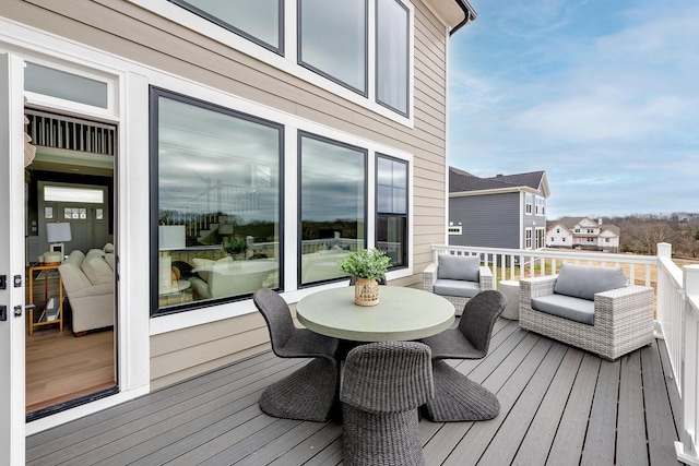 deck with an outdoor hangout area