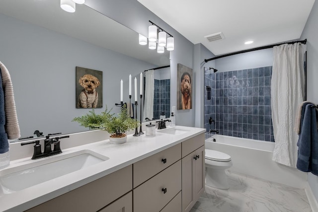 full bathroom featuring vanity, toilet, and shower / bath combo