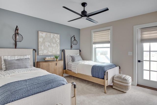 bedroom featuring ceiling fan and carpet flooring