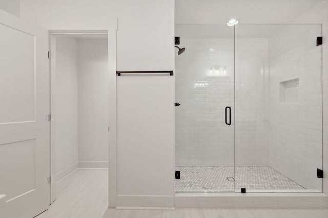 bathroom featuring walk in shower