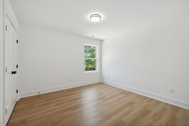 empty room with light wood-type flooring