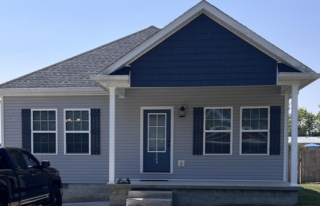 view of front of property featuring covered porch