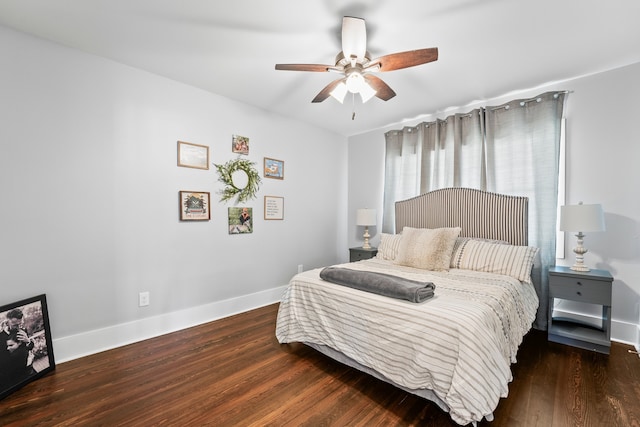 bedroom with dark wood-type flooring and ceiling fan