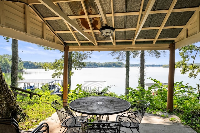 view of patio featuring a water view