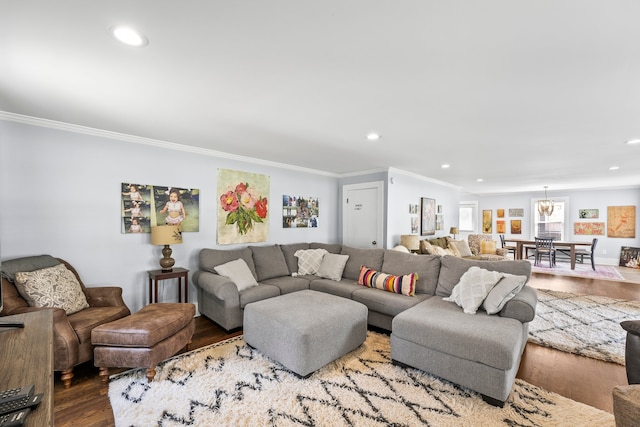 living room featuring ornamental molding and hardwood / wood-style floors