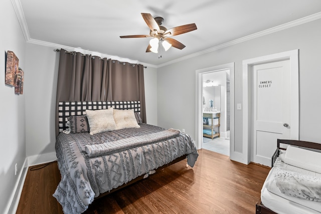 bedroom with ceiling fan, crown molding, and wood-type flooring