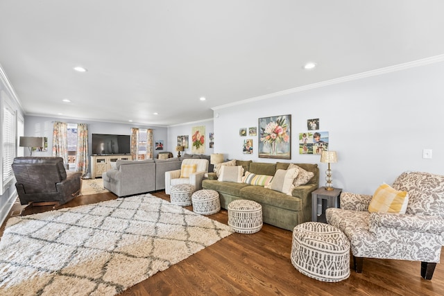 living room with ornamental molding and hardwood / wood-style floors