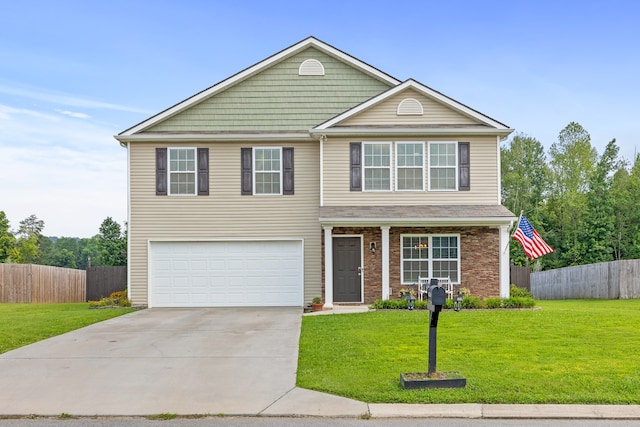 view of front property featuring a garage and a front lawn