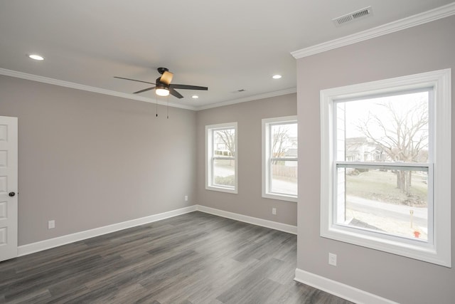 spare room with crown molding, ceiling fan, and dark hardwood / wood-style floors