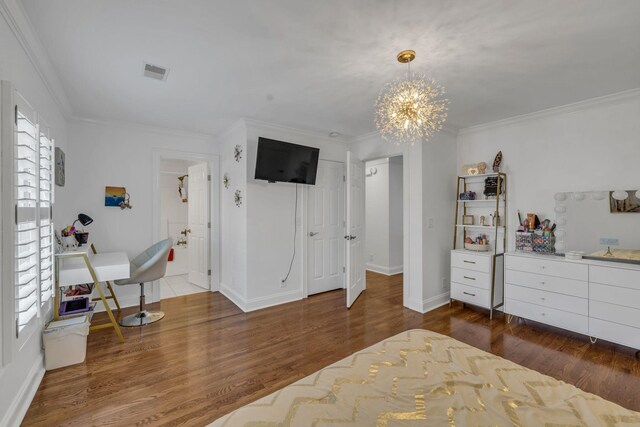 bedroom with multiple windows, dark hardwood / wood-style floors, and crown molding