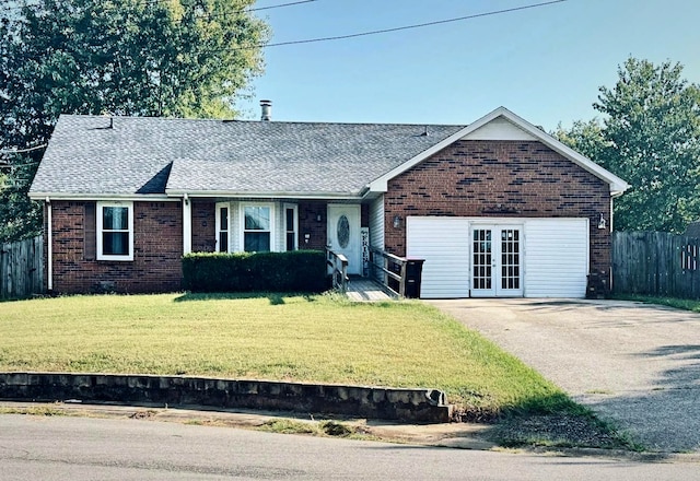 single story home featuring french doors and a front lawn