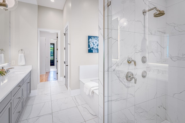 bathroom with plus walk in shower and vanity