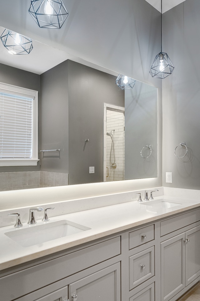 bathroom with vanity and walk in shower