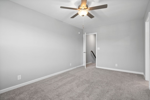 unfurnished room featuring carpet flooring and ceiling fan