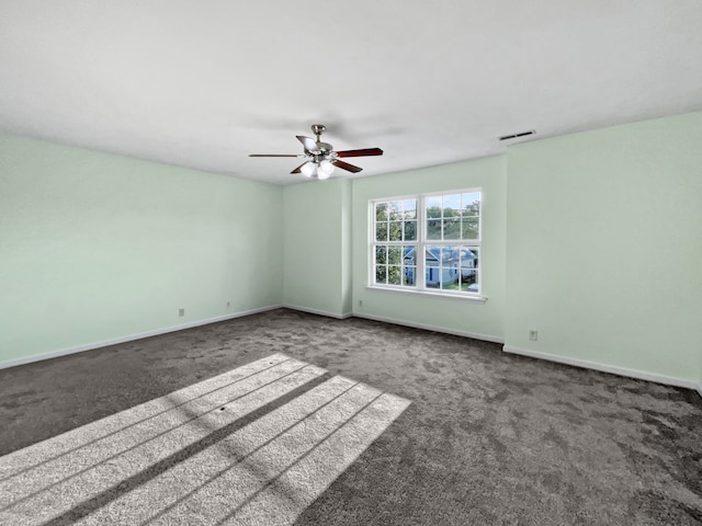 carpeted empty room with ceiling fan