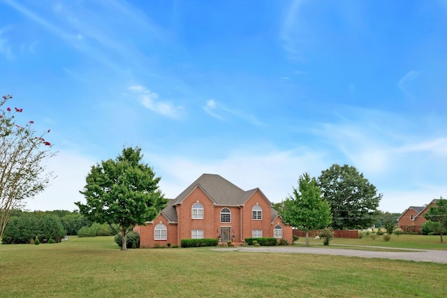 view of front of home with a front lawn