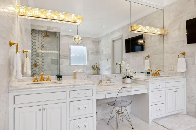 1077 Stockett Dr, Nashville, TN 37221 - bathroom with double vanity, a sink, tiled shower, and tile walls