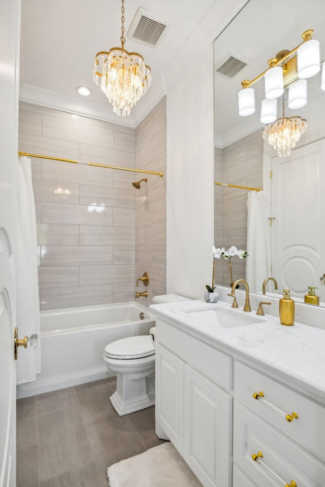 1077 Stockett Dr, Nashville, TN 37221 - bathroom with ornamental molding, toilet, a notable chandelier, and visible vents