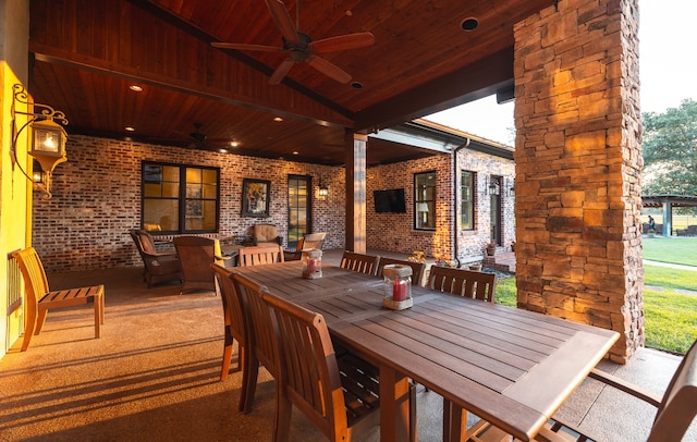 exterior space with ceiling fan