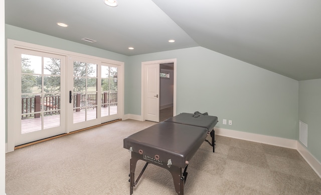 rec room with lofted ceiling and carpet flooring