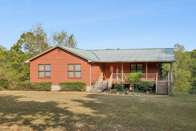 view of front of home featuring a front lawn and a porch