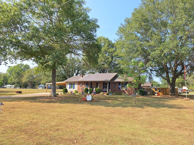 ranch-style house with a front lawn