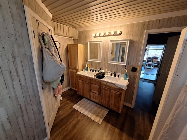 bathroom featuring wooden ceiling, vanity, wood-type flooring, and wood walls