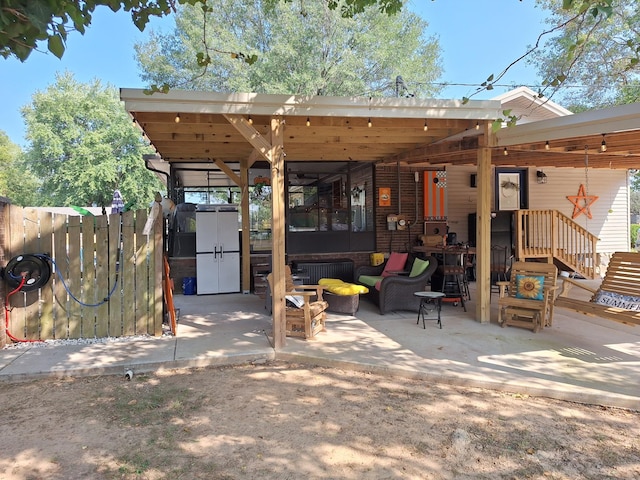 view of patio / terrace with fence